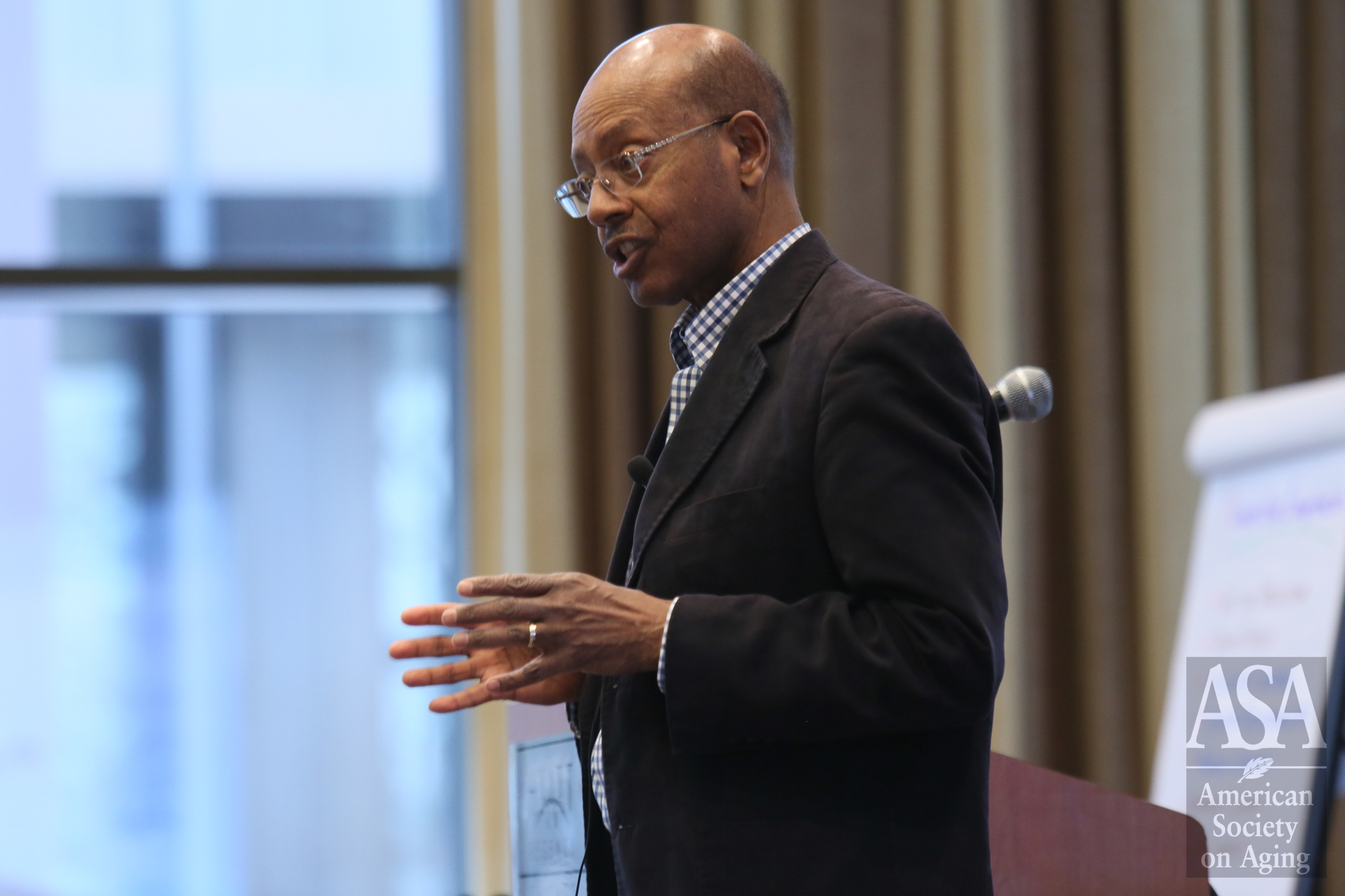 Robert Carpenter speaking at an American Society on Aging event
